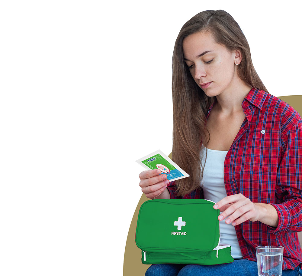 Woman opening a first aid kit