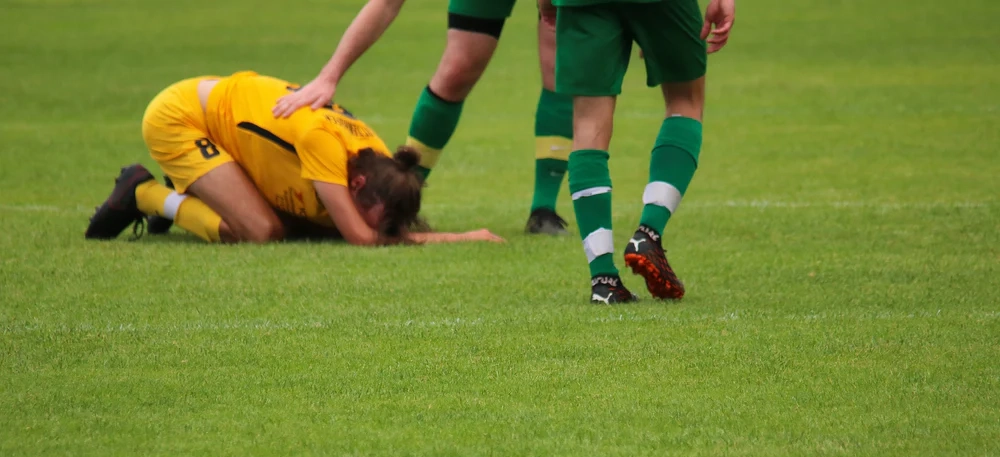 An injured football player