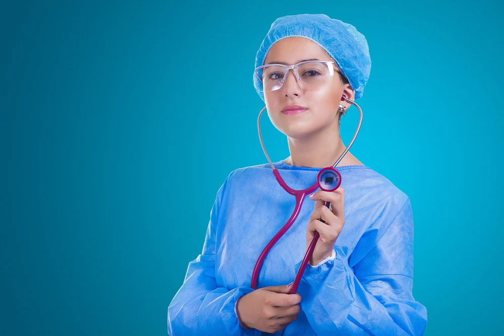 A doctor holding a stethoscope 